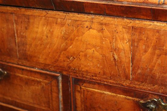 An early 18th century herringbone crossbanded walnut bureau (a.f.) W.76cm